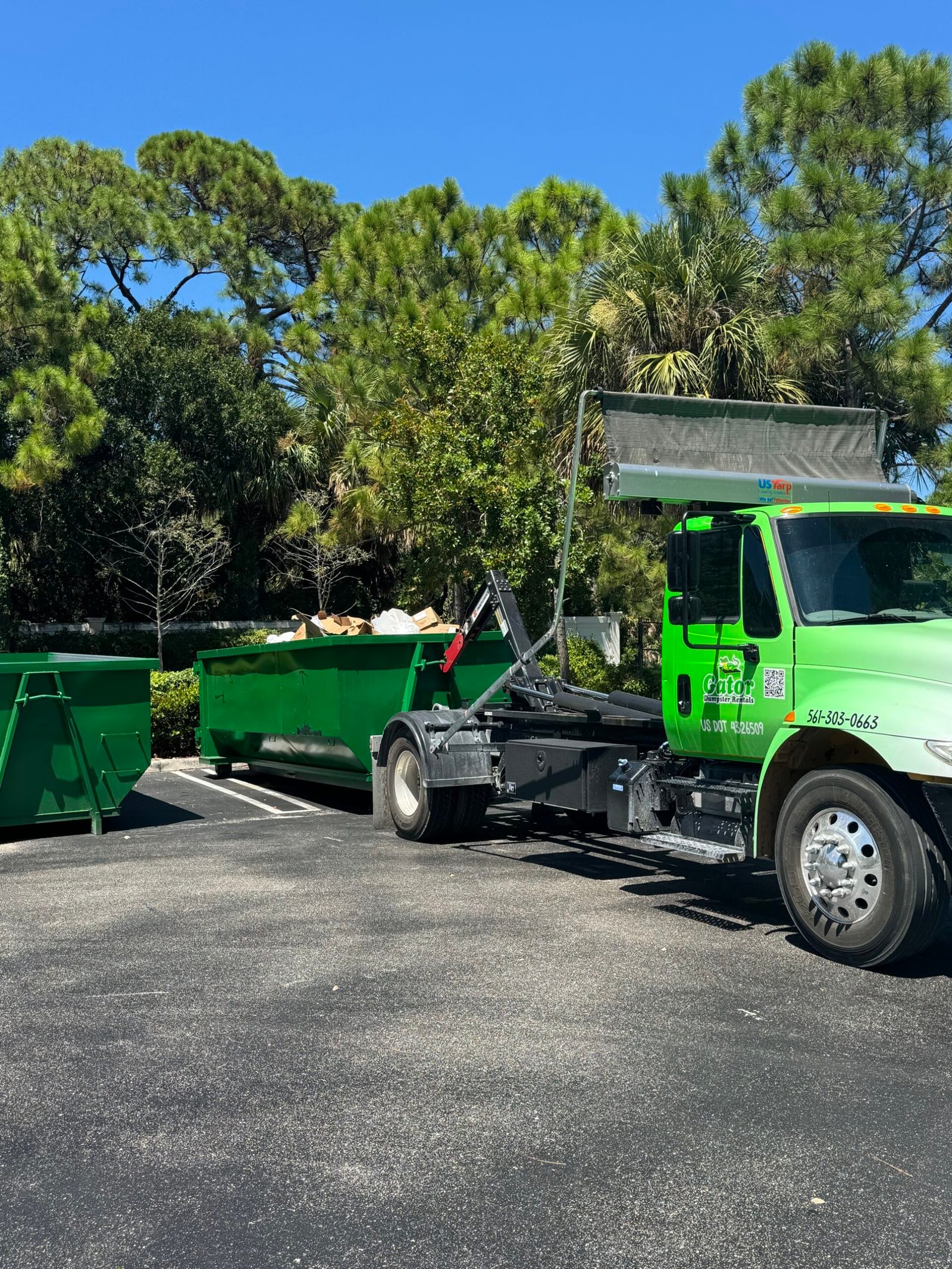 Roll-off dumpster rental in Palm Beach Gardens with driveway protection